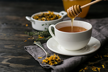 Mountain Ridge Honey helps ease flu symptoms when mixed with tea.